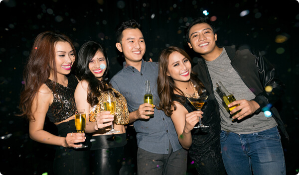 A group of young single Asian men and women at an event
